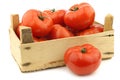 Fresh beef tomatoes in a wooden crate Royalty Free Stock Photo