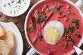 Fresh beet soup with egg close up. horizontal top view Royalty Free Stock Photo