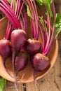 Fresh beet in wooden bowl