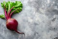 Fresh beetroot with leaves on grey background,  Top view, copy space Royalty Free Stock Photo