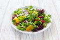 Fresh beetroot, orange, soft cheese and greens salad