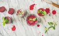 Fresh beetroot smoothie in glasses over marble background Royalty Free Stock Photo