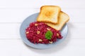 Fresh beetroot spread with toasts Royalty Free Stock Photo
