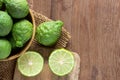 Fresh bergamot and bergamot slice in wooden bowl Royalty Free Stock Photo