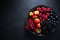 Fresh berries in bowl, antioxidant concept Royalty Free Stock Photo