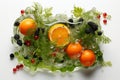 Fresh berries, oranges, and dill greens washing in clear water, getting ready for consumption