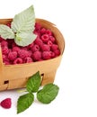 Fresh berries raspberry in wicker basket Royalty Free Stock Photo