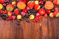 Fresh berries on wooden table Royalty Free Stock Photo