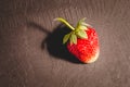 Fresh berry of strawberry on black table/ Strawberry. Fresh berry of strawberry on black table closeup