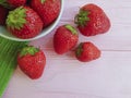 Fresh berry strawberry natural summer dish towel on a pink wooden background Royalty Free Stock Photo