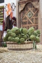 Background of fresh artichokes. Background of fresh artichokes. Fresh artichokes on display at the farmers` market for sale. Royalty Free Stock Photo