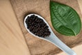 Fresh black cambodian pepper corn in bowl, cooking preparation