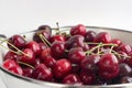 Fresh black cherry in colander