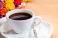 Fresh black coffee and roses for breakfast Royalty Free Stock Photo