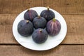 Fresh black figs age paintings, fresh fig fruit in dish, Royalty Free Stock Photo