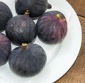 Fresh black figs age paintings, fresh fig fruit in dish, Royalty Free Stock Photo