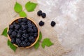 Fresh blackberries in a wooden plate. View from above Royalty Free Stock Photo