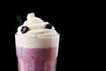Fresh blackberry milkshake close-up