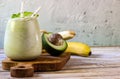 Fresh blended Banana and avocado smoothie Royalty Free Stock Photo