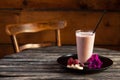 Fresh blended smoothie with ingredients on wooden table Royalty Free Stock Photo