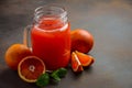 Fresh blood orange juice in jar on dark background. Royalty Free Stock Photo