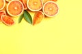 Fresh bloody oranges on color background, flat lay. Citrus fruits