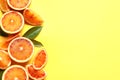 Fresh bloody oranges on color background, flat lay with space for text.