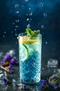 Fresh blue lagoon cocktail with lime, mint and ice in jar glass on dark blue background. Studio shot of drink in freeze motion, Royalty Free Stock Photo