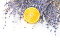 Fresh blue lavender with big lemon slice on white Royalty Free Stock Photo