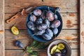 Freshly picked plums in a bowl