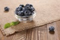 Fresh blueberries on a background of burlap Royalty Free Stock Photo