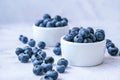 Fresh blueberries background with copy space. Blueberry antioxidant organic superfood in bowls concept for healthy Royalty Free Stock Photo