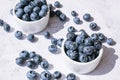 Fresh blueberries background with copy space. Blueberry antioxidant organic superfood in bowls concept for healthy Royalty Free Stock Photo