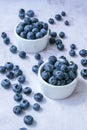 Fresh blueberries background with copy space. Blueberry antioxidant organic superfood in bowls concept for healthy Royalty Free Stock Photo