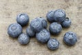 Fresh blueberries on a grungy textured metal tray