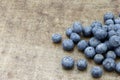 Fresh blueberries on a grungy textured metal tray