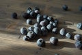 Fresh blueberries on old wood background