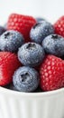 Fresh Blueberries and Raspberries in Bowl Royalty Free Stock Photo
