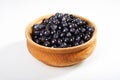 Fresh blueberries in a wooden bowl on white Royalty Free Stock Photo