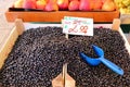 Fresh blueberries in a wooden box for sale