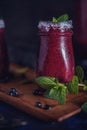 Fresh blueberry milkshake with mint herb Royalty Free Stock Photo