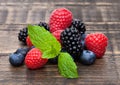 Fresh blueberry raspberry and blackberry with mint Royalty Free Stock Photo