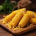 Fresh boiled corn cobs with sea salt and basil on the serving board on black rustic background. Healthy diet food concept Royalty Free Stock Photo