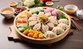 Fresh boiled dumplings. Chinese new year platter colorful dumplings