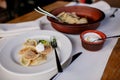 Boiled Mixed Shrimp Dumplings, Fish Ball On Dish With sour cream.