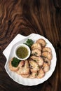 Fresh boiled prawns with zesty citrus dipping sauce Royalty Free Stock Photo