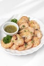 Fresh boiled prawns with zesty citrus dipping sauce Royalty Free Stock Photo