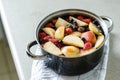 Fresh boiled traditional ukrainian and polish kompot with strawberries, blueberries and blackberries Royalty Free Stock Photo