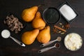 Red Wine Poached Pears with Dark Chocolate & Vanilla Cream Ingredients Royalty Free Stock Photo