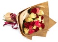 Fresh, bouquet of roses wrapped in kraft paper for gift, isolated on white background. Royalty Free Stock Photo
